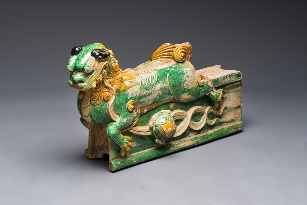 A large Chinese sancai-glazed pottery 'Buddhist Lion' roof tile, Ming