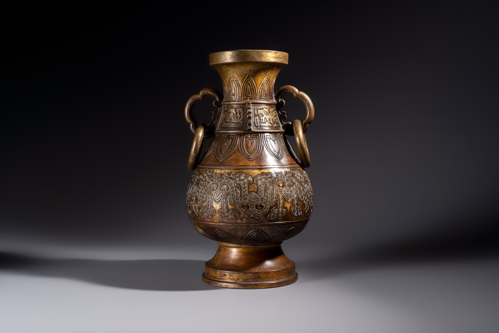 A fine and large Chinese archaistic gilt-bronze vase with handles, Ming