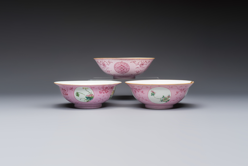 Three Chinese famille rose pink-ground bowls with floral design, Qianlong mark and of the period