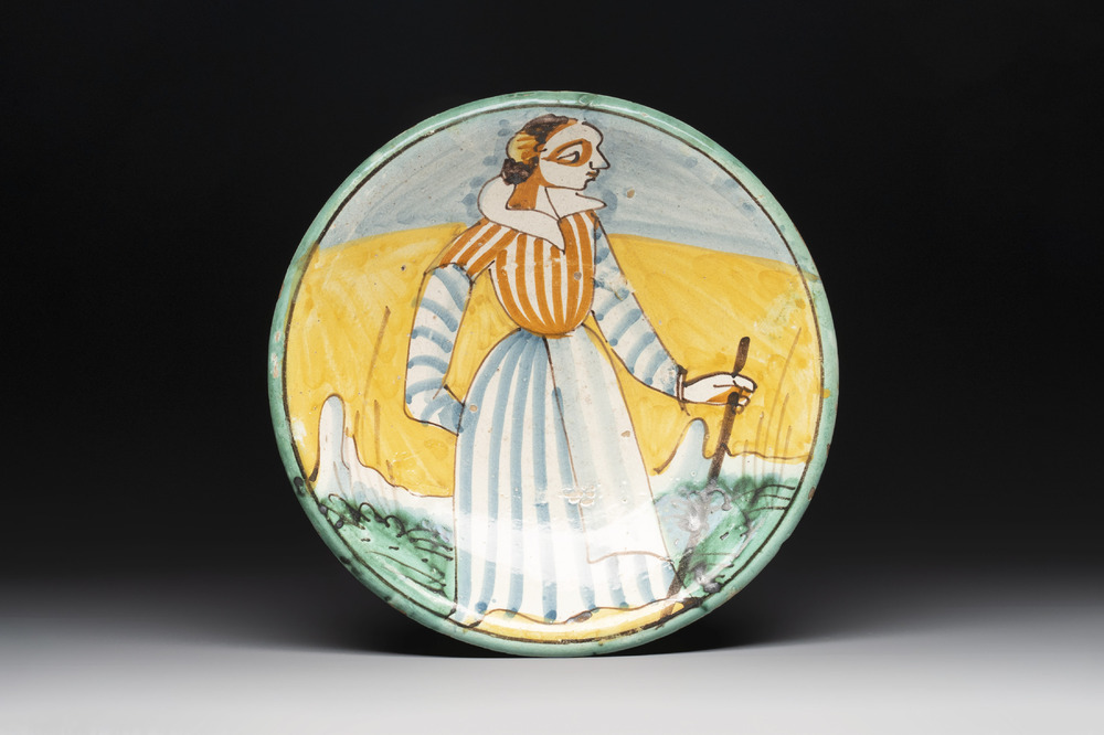 An Italian maiolica dish with a lady, Montelupo, 17th C.