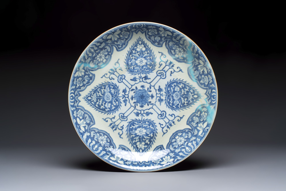 A large Chinese blue and white dish with floral design, Kangxi