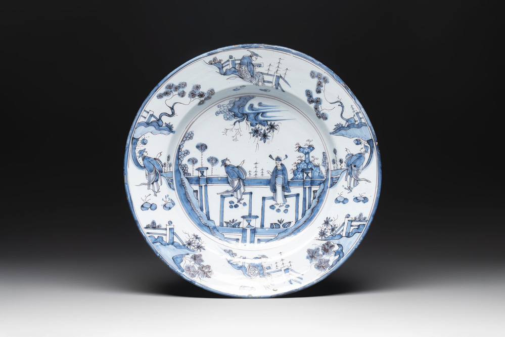 A blue and white 'figures in a garden' chinoiserie dish, Frankfurt, 17th C.