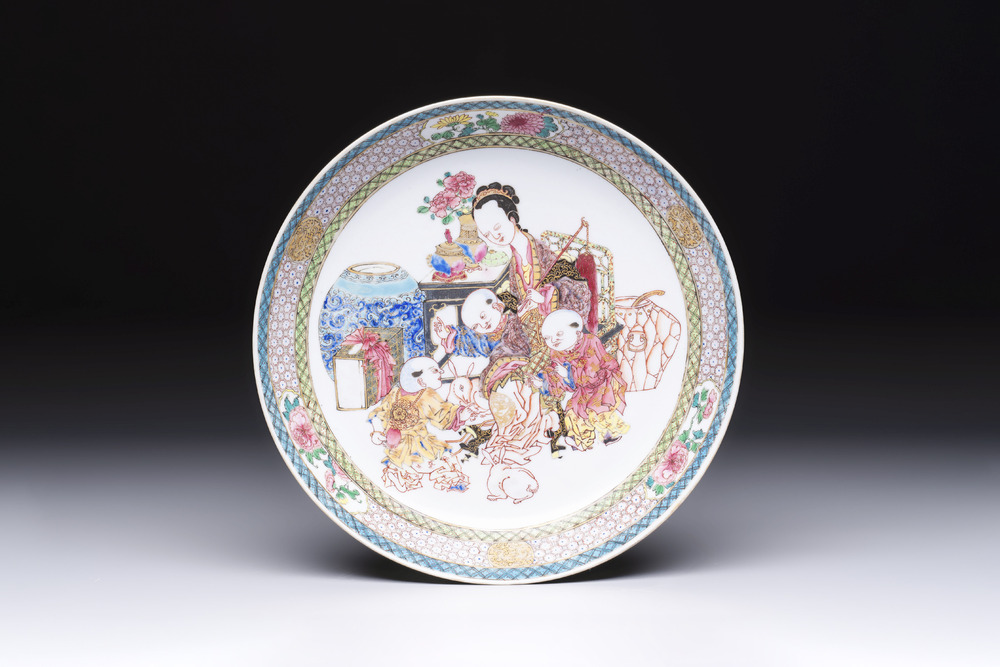 A fine Chinese famille rose eggshell plate with a lady and playing boys, Yongzheng