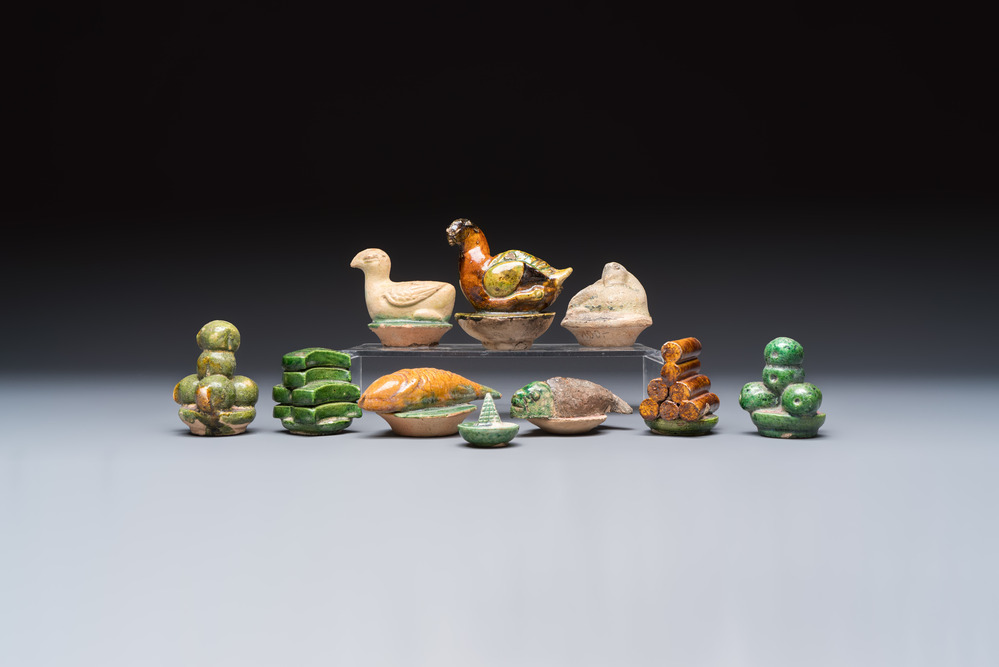 A group of ten Chinese glazed pottery mingqi, Ming