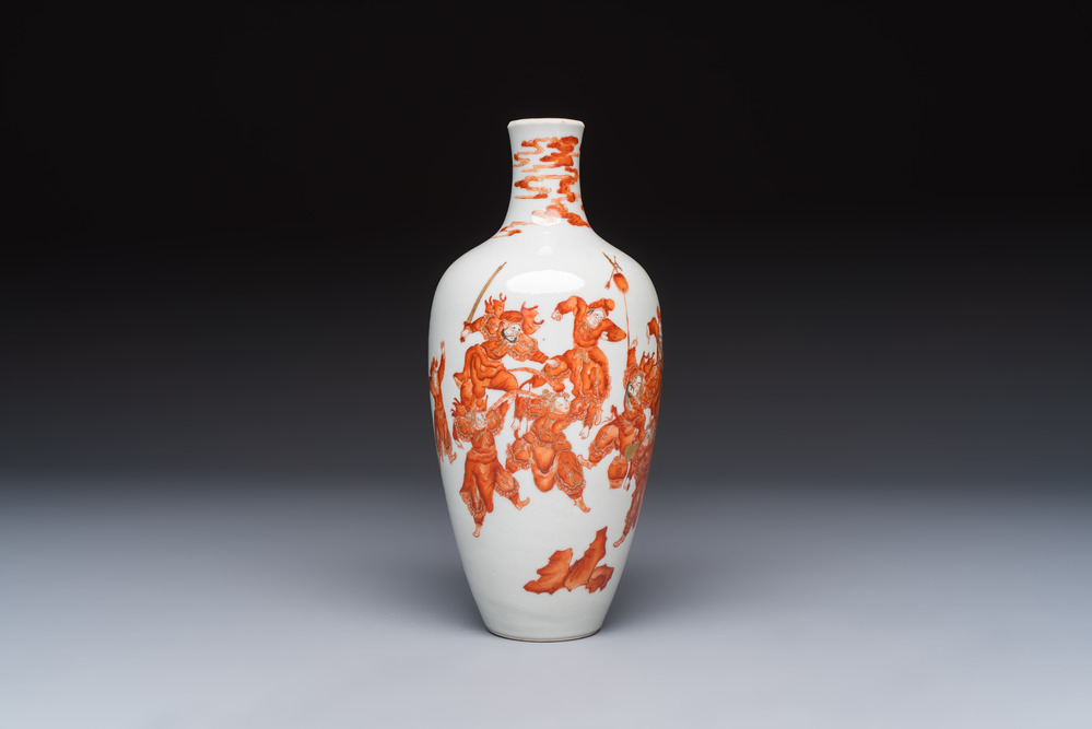 A Chinese iron-red and gilt-decorated vase with a narrative design, Qianlong mark, 19th C.