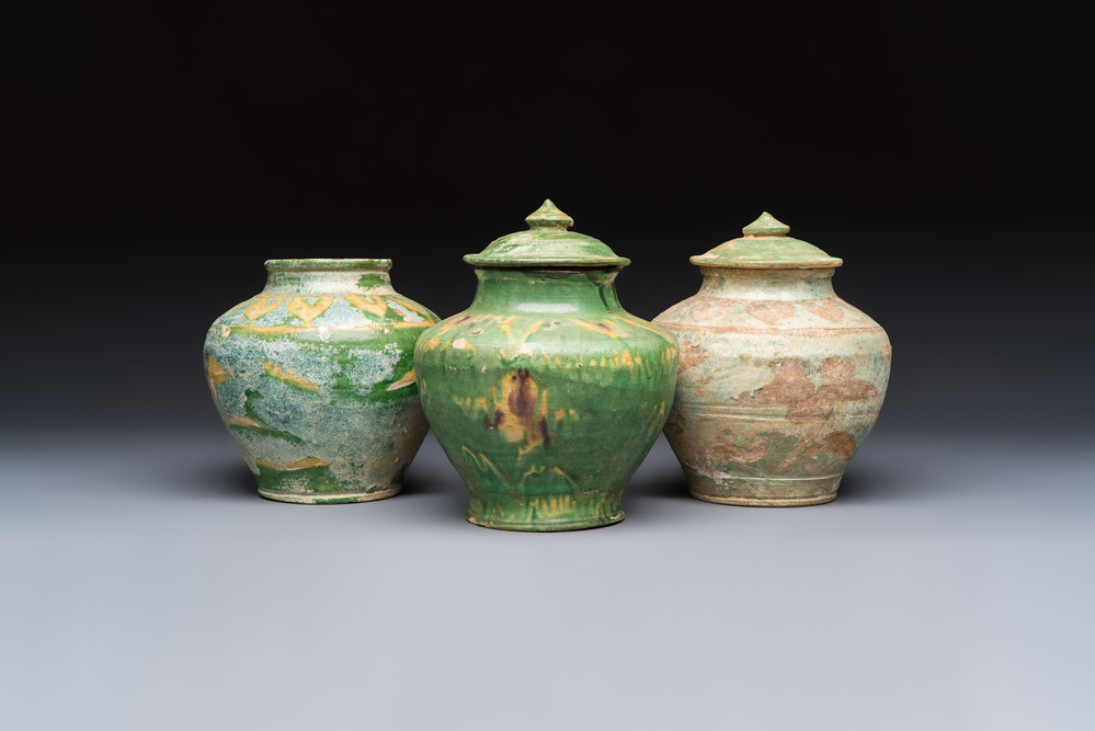 Three Chinese sancai-glazed pottery jars, two with cover, Ming or earlier
