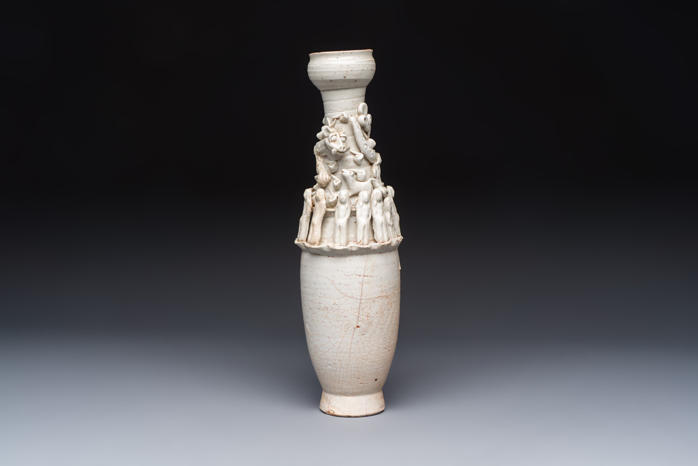 A Chinese qingbai urn applied with immortals and a dragon, Northern Song