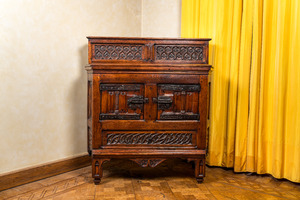 Een neogotische houten kast met oudere elementen met smeedijzeren beslag, 19e eeuw