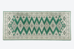 Un tapis oriental à décor de motifs géométriques, laine sur coton, 20ème