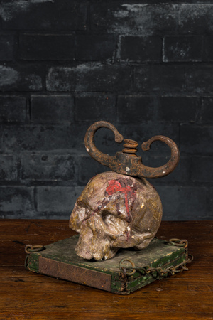 A macabre polychrome wood sculpture with a skull, 19/20th C.