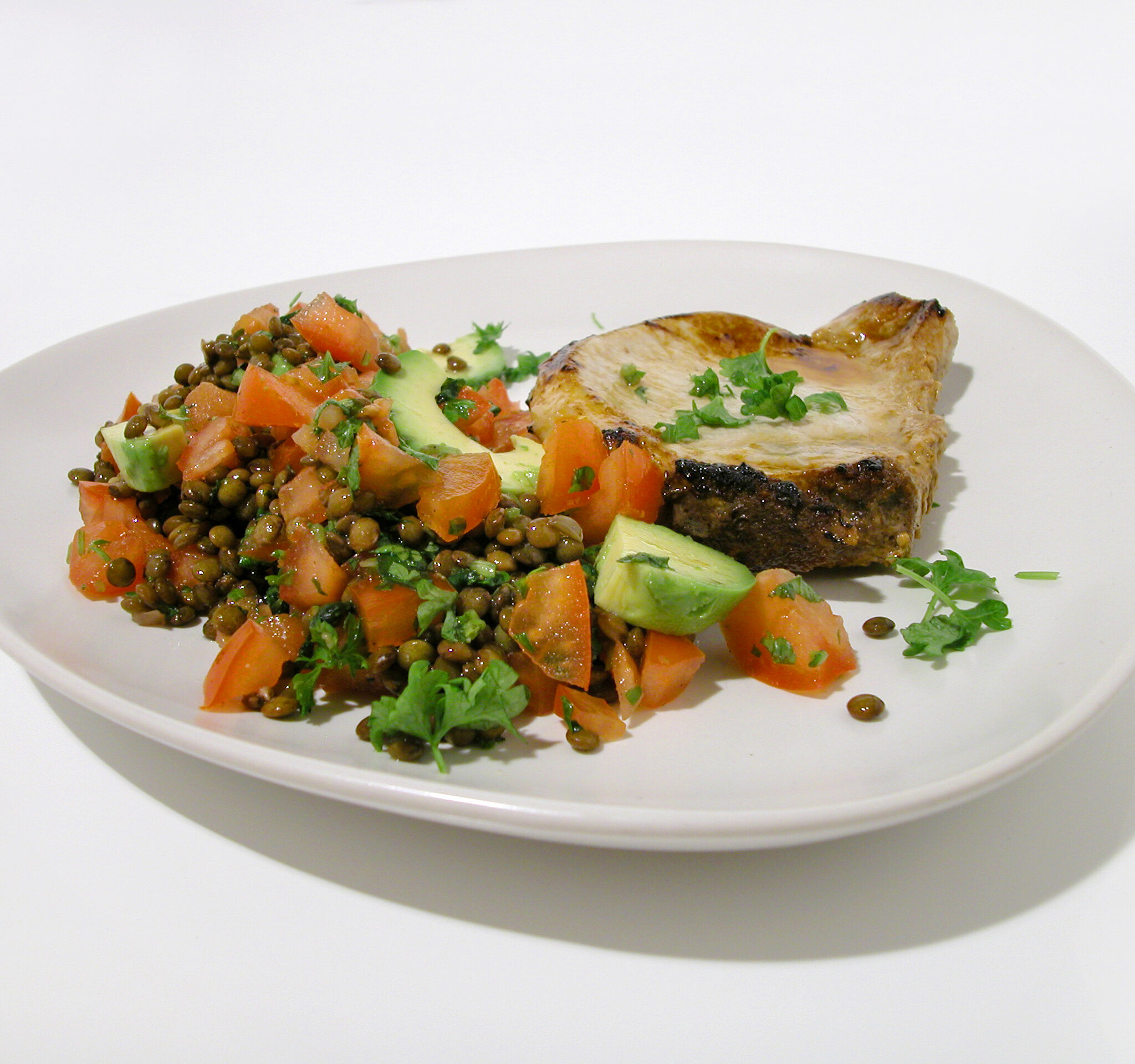 Fläskkotlett med sallad på puylinser och citrondressing
